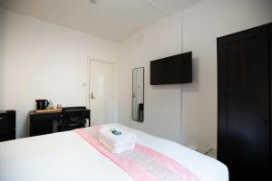 TV a/nebo společenská místnost v ubytování Bennet House + 9 fotografií