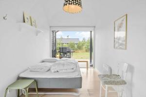 Postel nebo postele na pokoji v ubytování JB366-Brovst-Kronvildtvej-118