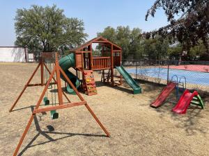 a playground with a slide and slidesktop at Rancho el Andariego and La Catrina  +40 photos