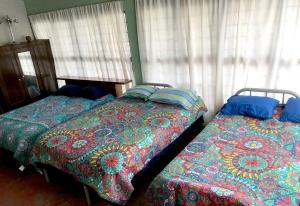 Postel nebo postele na pokoji v ubytování Rancho el Andariego and La Catrina