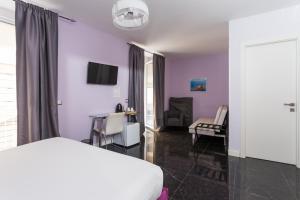 TV a/nebo společenská místnost v ubytování Chiaia 205 By Dimorra