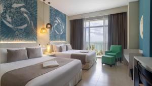 Postel nebo postele na pokoji v ubytování Gran Evenia Bijao - All Inclusive