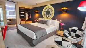 Postel nebo postele na pokoji v ubytování Gran Evenia Panamá Hotel