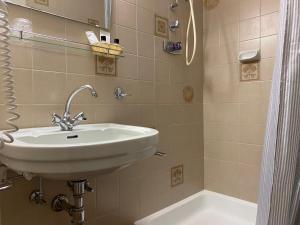 Koupelna v ubytování Ciasa Soreghina