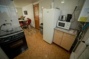 Kuchyň nebo kuchyňský kout v ubytování Departamento Ovejero