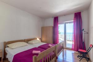 Postel nebo postele na pokoji v ubytování Seaside secluded apartments Cove Torac, Hvar - 575