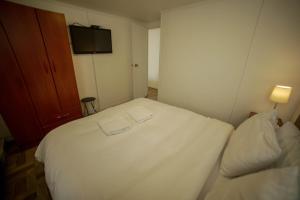 Postel nebo postele na pokoji v ubytování Departamento Ovejero