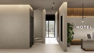 TV a/nebo společenská místnost v ubytování Monarc Hotel