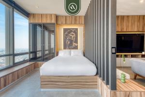 Ένα ή περισσότερα κρεβάτια σε δωμάτιο στο Luxury Studio - Pool - Revolution Monument View +28 φωτογραφίες