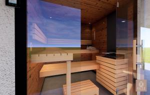 une chambre avec un sauna avec une grande fenêtre dans l'établissement Feelfree Apartments Ochsengarten, à Oetz