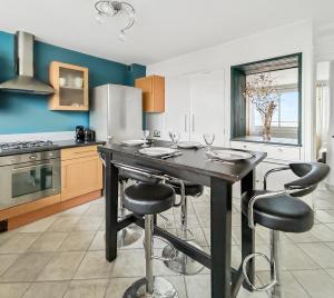 Η κουζίνα ή μικρή κουζίνα στο Vue panoramique sur la plage, grand T2 +18 φωτογραφίες