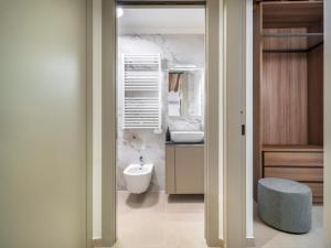 a bathroom with a sink and a toilet in it at Palazzo Degli Eletti R&R in Venice