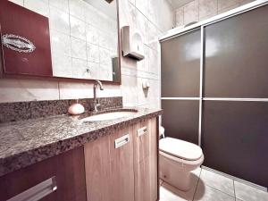 Koupelna v ubytování Serra e Mar + 16 fotografií