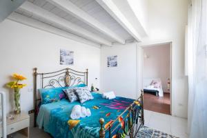 Ένα ή περισσότερα κρεβάτια σε δωμάτιο στο Breeze Haven Villetta