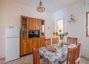 Kuchyň nebo kuchyňský kout v ubytování Sabbia e Sorrisi Sea View