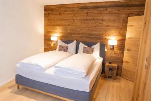 Postel nebo postele na pokoji v ubytování Terra Alpina + 7 fotografií