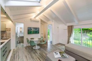 a living room with a couch and a table at Agave Apartment in Vico Equense