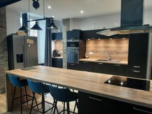 Η κουζίνα ή μικρή κουζίνα στο Le canon des remparts