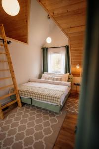 Ένα ή περισσότερα κρεβάτια σε δωμάτιο στο Nord Hill - Zlatar Hill - kuća za odmor