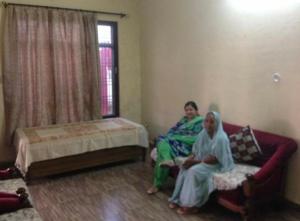 Giường trong phòng chung tại City Central Bungalow,Ram mandir