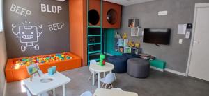 Μια τηλεόραση ή/και κέντρο ψυχαγωγίας στο Apartamento próximo ao Allianz Parque e Bola de Neve Lapa