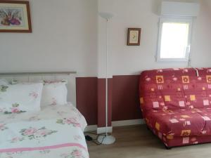 Postel nebo postele na pokoji v ubytování Chambre D'hôtes Soizic