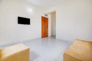 TV/trung tâm giải trí tại SPOT ON Hide Away Inn