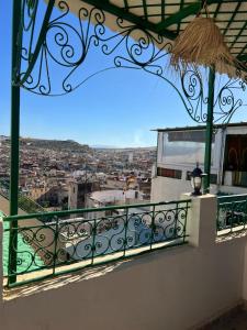 Un balcón con vista a una ciudad en Riad Dar Bahja - More Than a Stay, en Fez