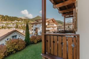 a view from the balcony of a house at Miraval Perathoner Andreas in Ortisei