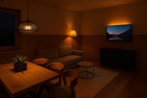 Χώρος καθιστικού στο BERGBLICK Penthouse - Opening December 2025 +25 φωτογραφίες