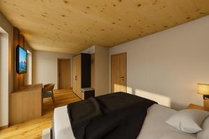 Ένα ή περισσότερα κρεβάτια σε δωμάτιο στο BERGBLICK Penthouse - Opening December 2025