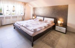 Postel nebo postele na pokoji v ubytování Haus Hornisgrindeblick