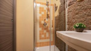 Koupelna v ubytování Sardinian Gallery Fonte