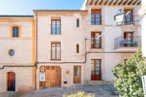 ポリェンサにあるCan 32 Apartamento 1 habitaciónのソリアナのイタリアの町の古民家