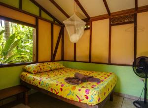 Ένα ή περισσότερα κρεβάτια σε δωμάτιο στο La Casa de Rolando