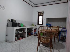 Kuchyň nebo kuchyňský kout v ubytování New Best Entire Villa