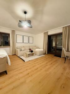 Ένα ή περισσότερα κρεβάτια σε δωμάτιο στο Chiemsee Studio - Kliniknähe I Therme & Ruhe +10 φωτογραφίες