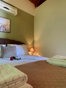 Postel nebo postele na pokoji v ubytování Panorama Beach