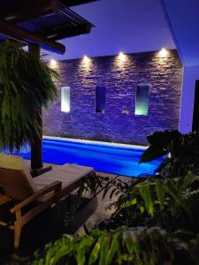 a house with a swimming pool at night at Condominio Panamá in Puerto Vallarta