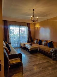 Ένα ή περισσότερα κρεβάτια σε δωμάτιο στο Beach apartment with pool Skhirat beach