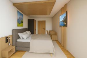 Ένα ή περισσότερα κρεβάτια σε δωμάτιο στο Panorama Zillertal Loft - Opening December 2025