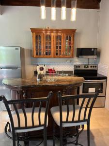 Kuchyň nebo kuchyňský kout v ubytování Blessed Villas and Resort + 1 fotografie