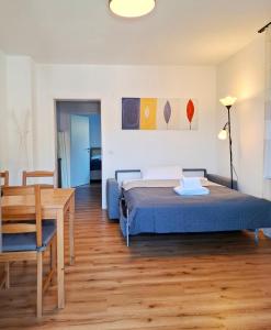 Postel nebo postele na pokoji v ubytování Villa Auszeit im Haus Auszeit im Weindorf 1 BR up to 3 people