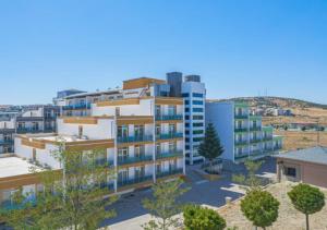 an architectural rendering of an apartment building at Dora Thermal Tatil Köyü & Spa in İhsaniye