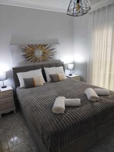 Postel nebo postele na pokoji v ubytování Faros & Beach View