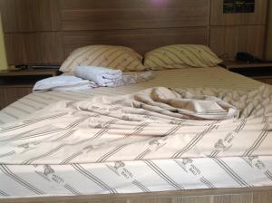 Ένα ή περισσότερα κρεβάτια σε δωμάτιο στο Hotel Bali +26 φωτογραφίες