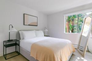 Ένα ή περισσότερα κρεβάτια σε δωμάτιο στο Blueground Shoreline West pool nr Shoreline Park SFO-2075 +26 φωτογραφίες