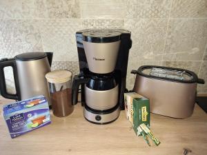Příslušenství pro přípravu čaje a kávy v ubytování Ferienwohnung Radszys