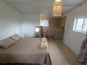 Giường trong phòng chung tại cabanita Celeste +5 ảnh