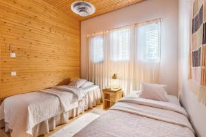 Postel nebo postele na pokoji v ubytování Villa Solvind - Hillside Villa Hosted by Hygge Host